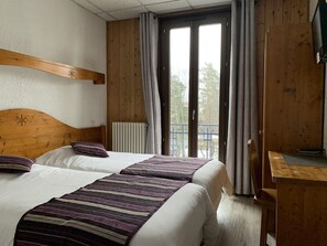 Twin kamer | Individueel gedecoreerd, individueel gemeubileerd, gratis wifi