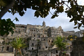 A historic town with old buildings and a prominent tower.