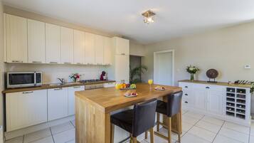 Apartment | Private kitchen | Fridge, microwave, oven, stovetop