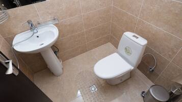 Economy Twin Room, Corner | Desk, iron/ironing board, free WiFi, bed sheets