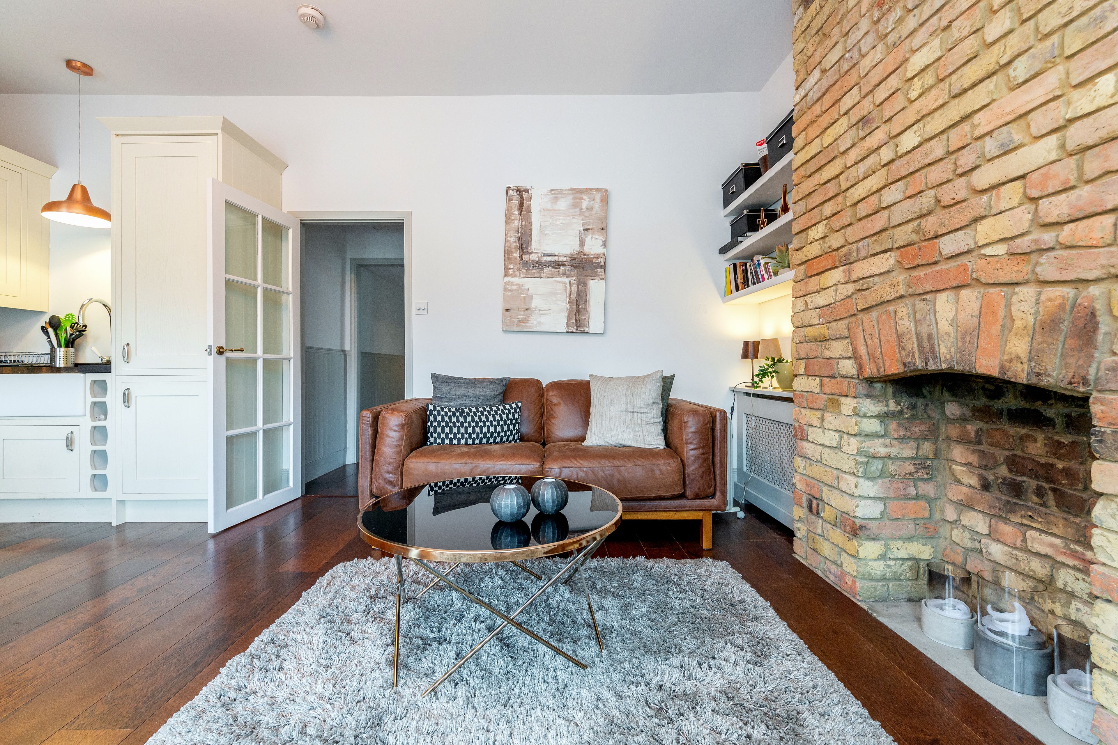 Apartamento, 2 quartos | Área de estar | TV de tela plana