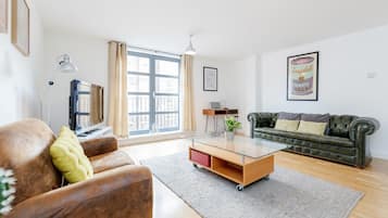 Apartment, 2 Bedrooms | Living area | Flat-screen TV, DVD player