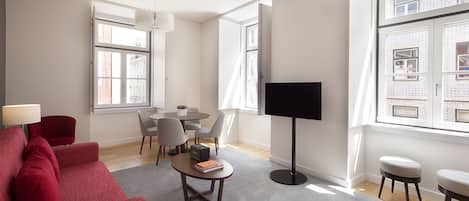 Apartment, 1 Bedroom (2 Adults + 2 Children) | Living room | 52-inch flat-screen TV with digital channels, TV