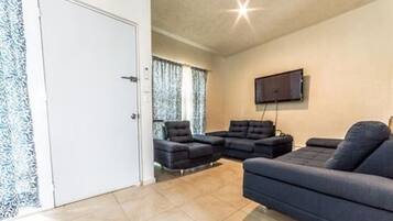 Casa | Área de sala de estar | Televisión de pantalla plana