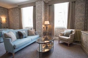 Feature Double Room | Living area | Flat-screen TV