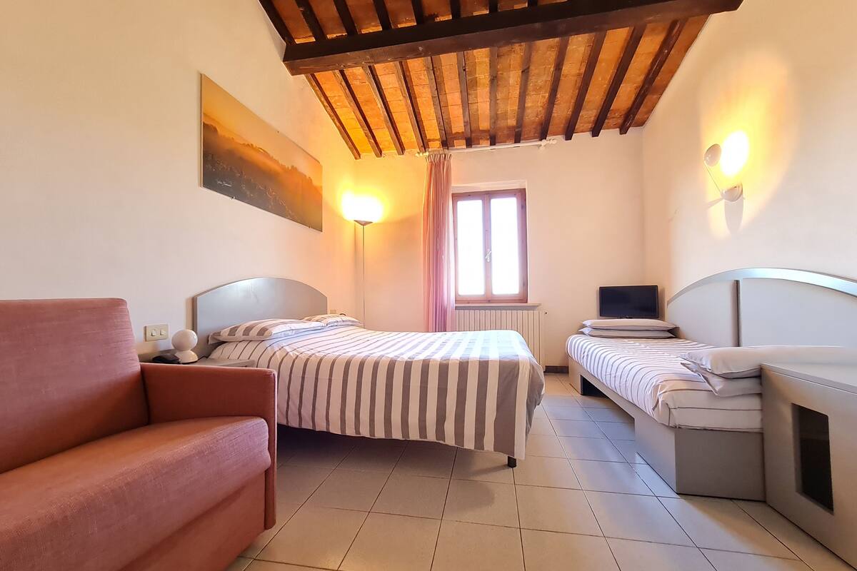 comfort triple room, annex building | minibar, in-room safe, desk, free wifi