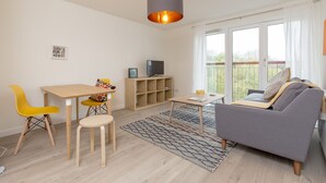 Comfort-Apartment, 2 Doppelbetten | Wohnbereich