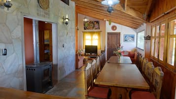 Deluxe Chalet, 3 Bedrooms, Mountain View | Living area | TV, fireplace, DVD player, ping pong
