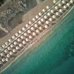On the beach, sun-loungers, beach umbrellas, beach towels