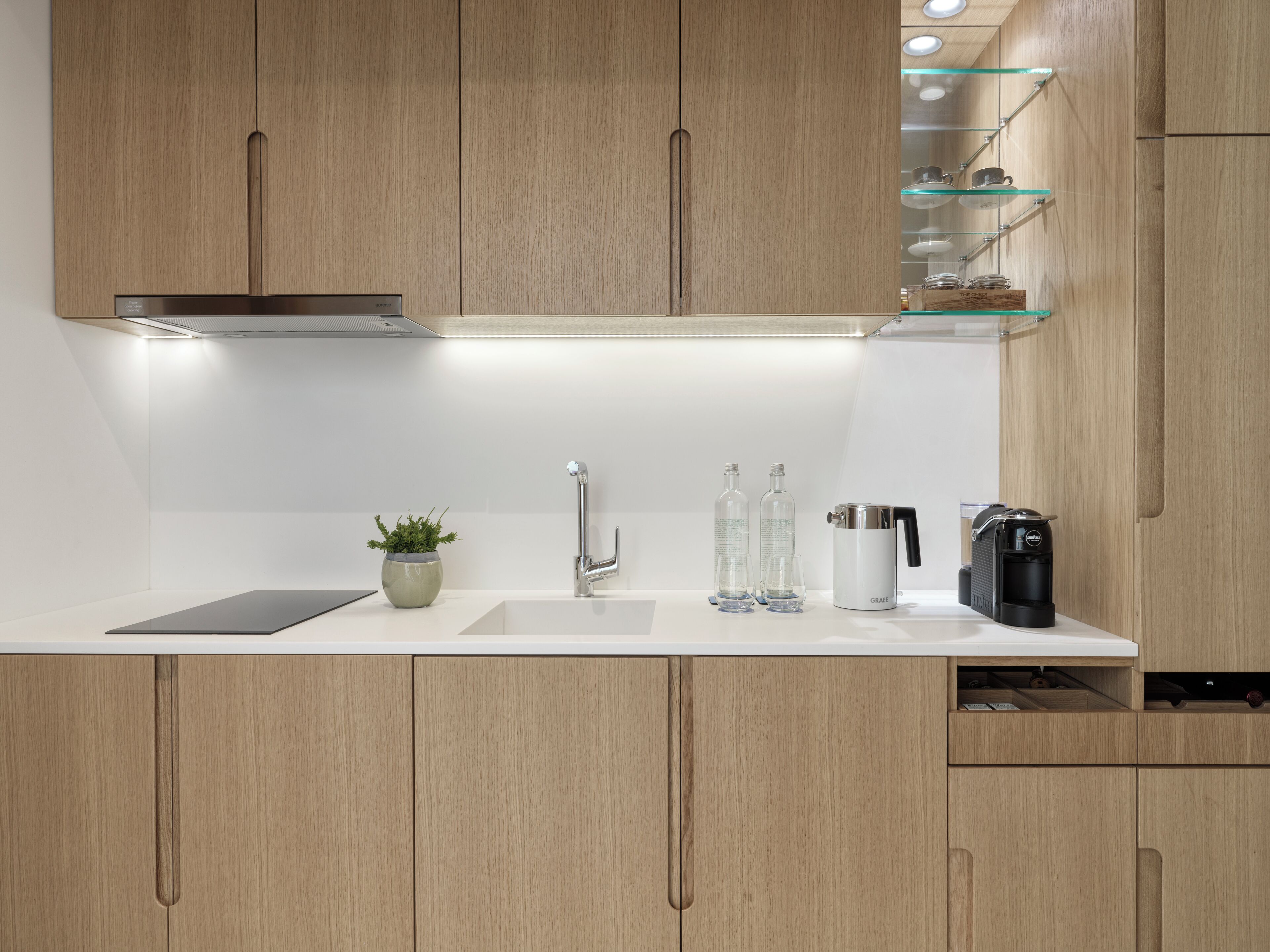 espresso maker, electric kettle, high chair