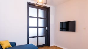 Flat-screen TV - Urban Suites Brussels Royal (Brussels)