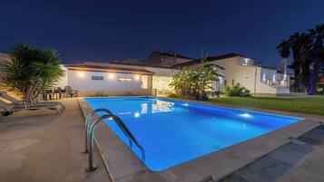 Outdoor pool, open 8 AM to 10 PM, sun loungers