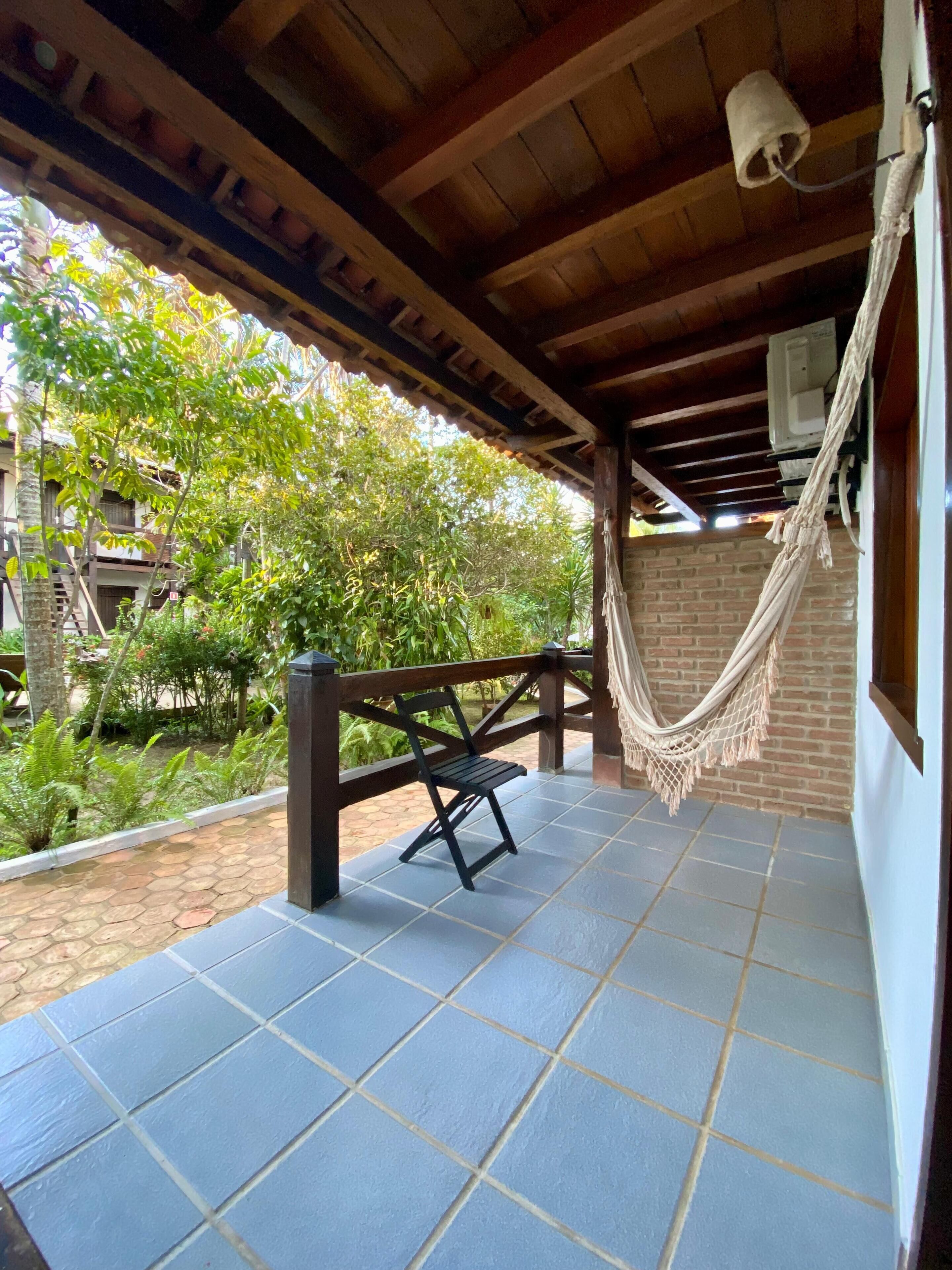 quadruple room, lanai, garden view | lanai