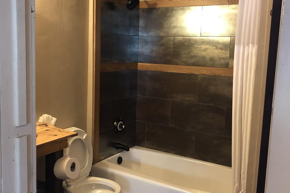 room #14, queen private | bathroom | combined shower/bathtub, towels