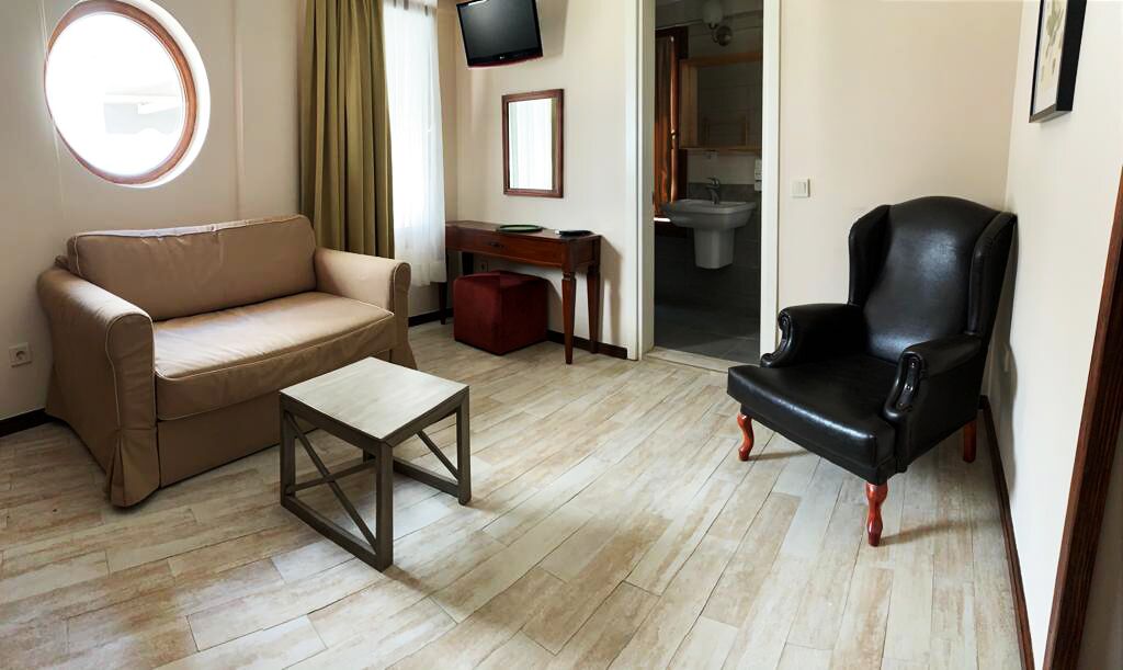 family triple room | living area | lcd tv