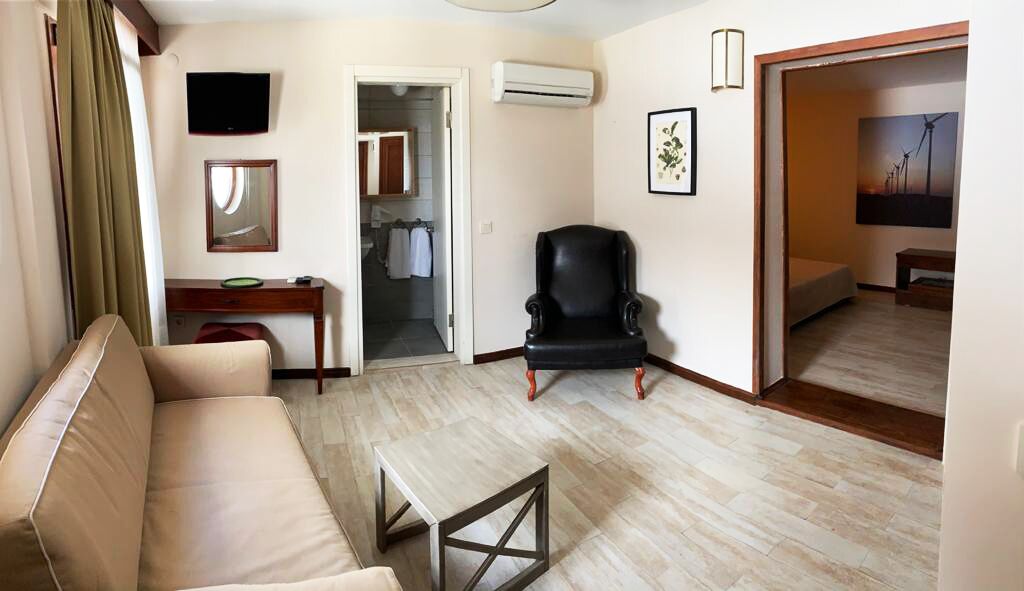 family triple room | living area | lcd tv