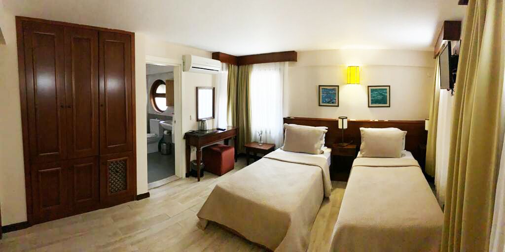 deluxe double or twin room | premium bedding, in-room safe, laptop workspace, free wifi