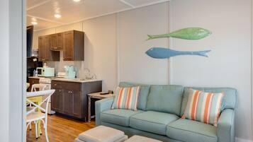 Deluxe Apartment, 2 Bedrooms | Living area | Smart TV