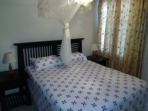 Suite Deluxe, 1 habitación | 1 habitación, escritorio, tabla de planchar con plancha y wifi gratis 