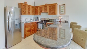 Deluxe Condo, 2 Bedrooms, Non Smoking | Private kitchen | Coffee/tea maker, full-sized fridge, microwave, oven - Bahia Azul 8B (Jacó)