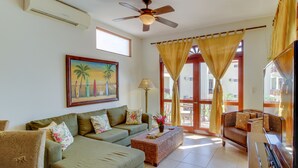 Deluxe Condo, 2 Bedrooms, Non Smoking | Living area | Flat-screen TV - Bahia Azul 8B (Jacó)