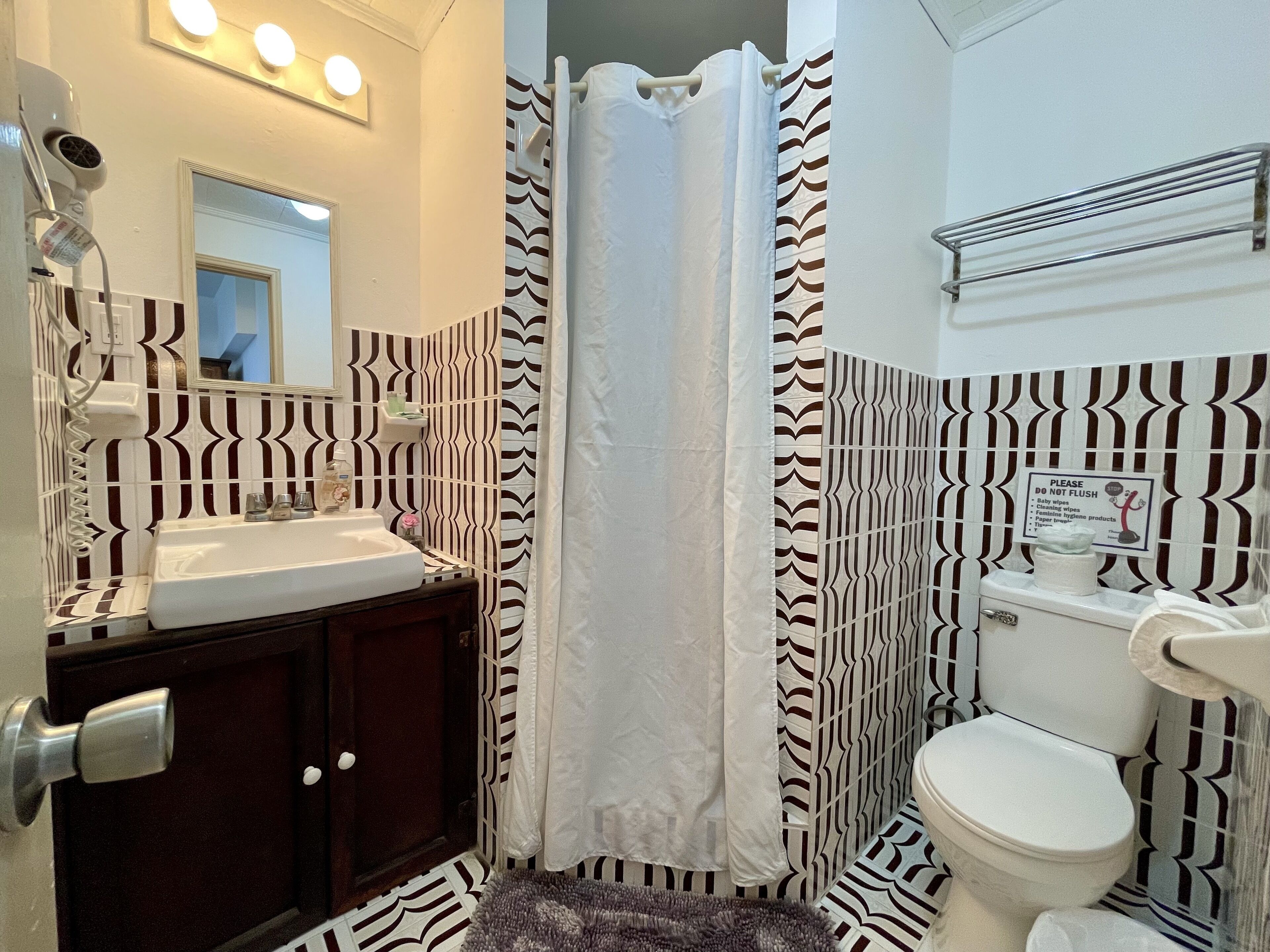 deluxe apartment, 2 bedrooms, ocean view | bathroom | rainfall showerhead, free toiletries, towels