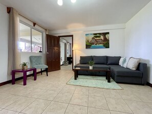 Deluxe Apartment, 1 Bedroom | Living area | Flat-screen TV