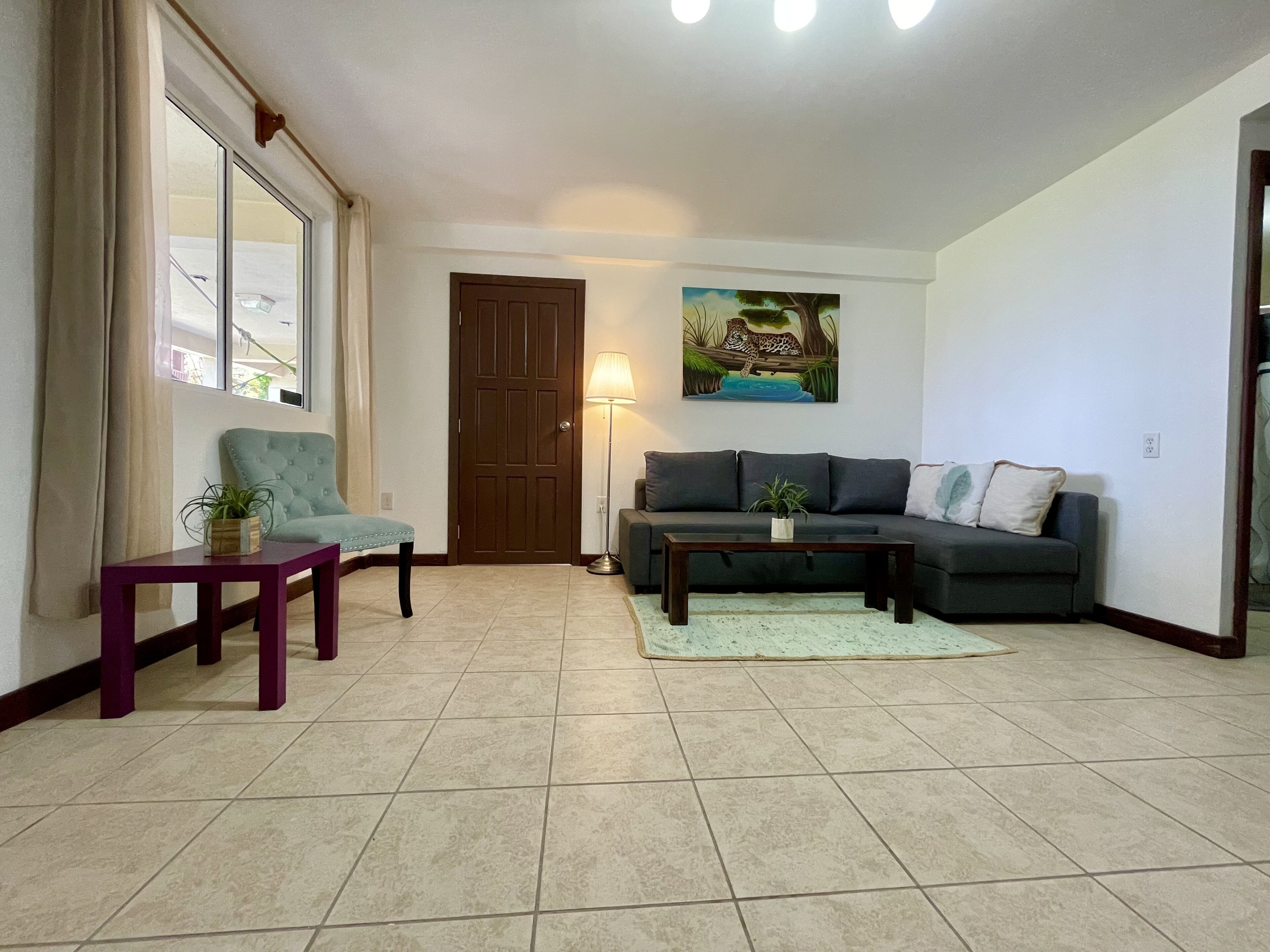 deluxe apartment, 1 bedroom | living area | flat-screen tv