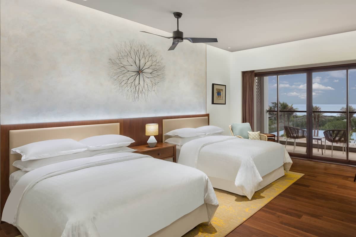 room, 2 queen beds, sea view (guest) | 1 bedroom, select comfort beds, in-room safe, individually furnished