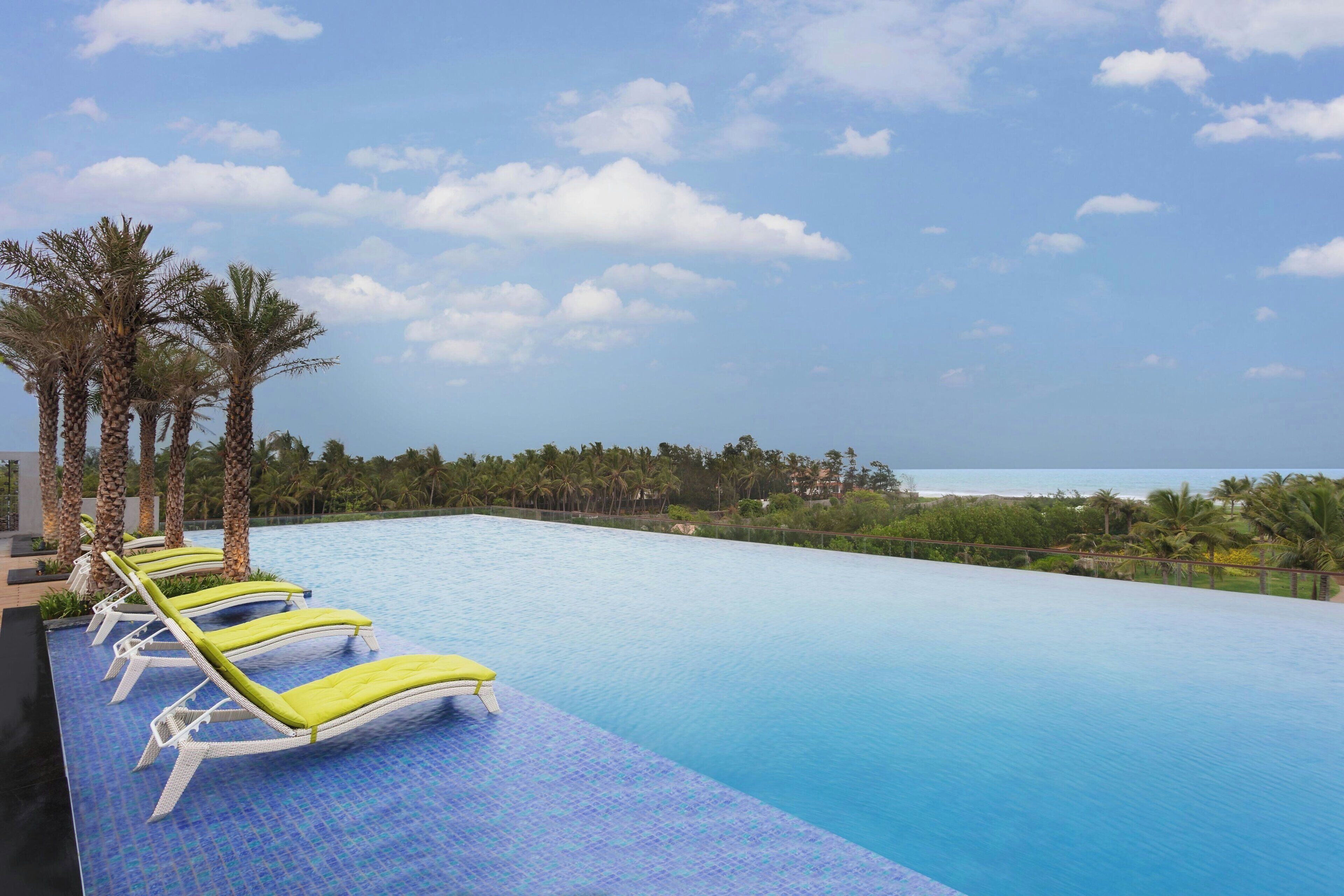 outdoor pool, open 8:00 am to 8:00 pm, free pool cabanas, pool umbrellas