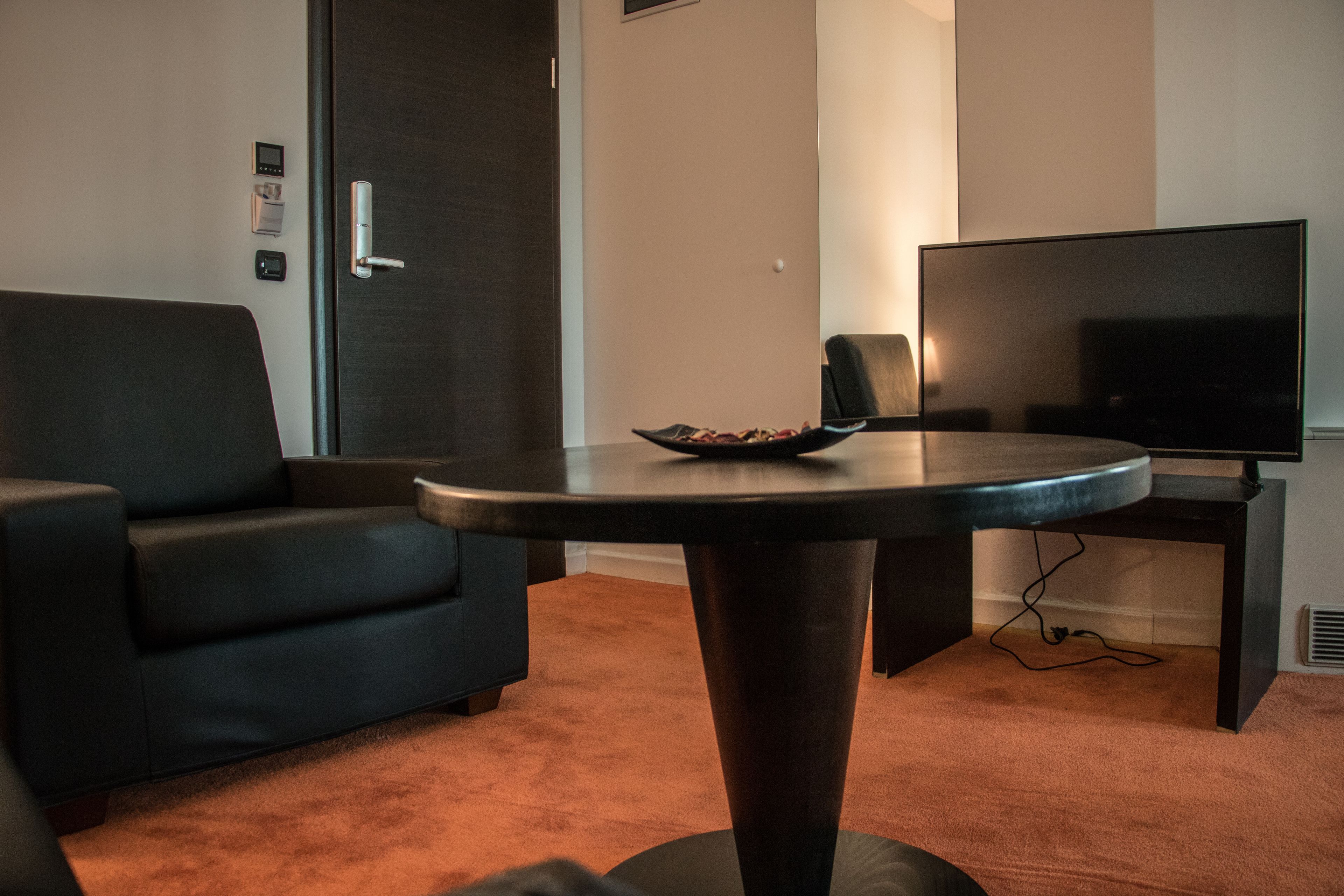 family suite, 1 king bed, non smoking (living room) | premium bedding, in-room safe, desk, blackout curtains