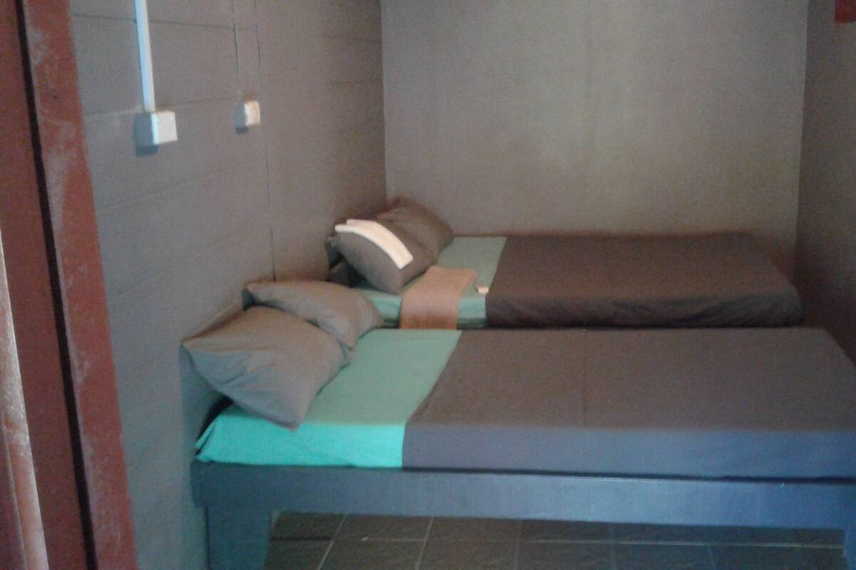 Bunk Beds in Mixed Dormitory | Blackout drapes, iron/ironing board, bed sheets