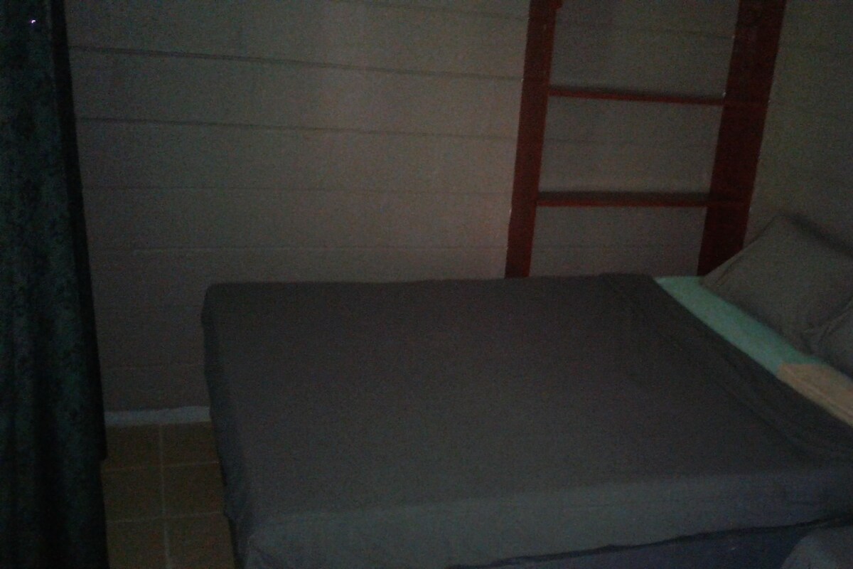 Deluxe Family Room | Blackout curtains, iron/ironing board, bed sheets
