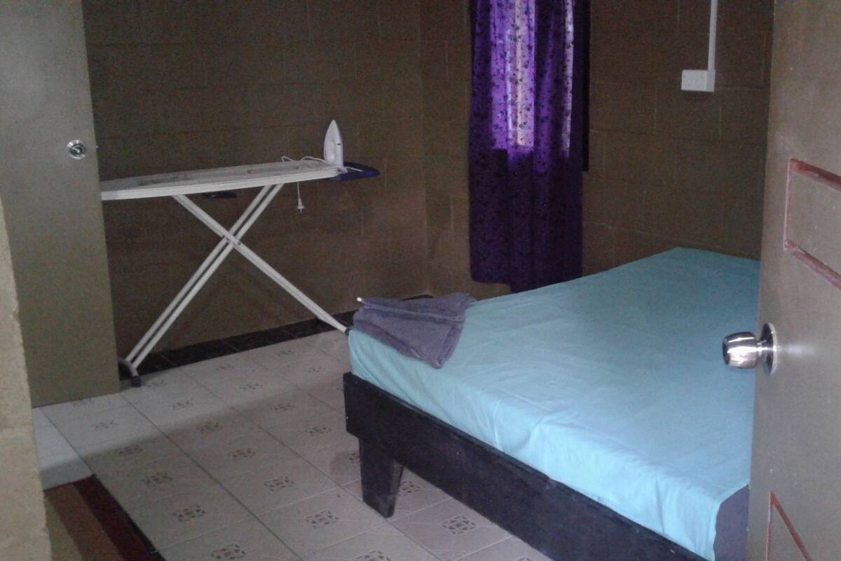 Queen Room with Balcony | Blackout drapes, iron/ironing board, bed sheets