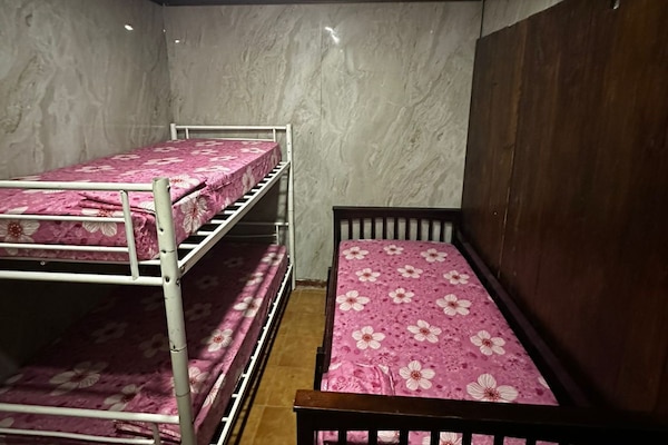 Economy Triple Room, 1 Bedroom | Iron/ironing board, free WiFi, bed sheets