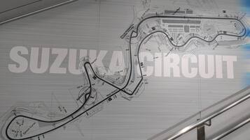 A detailed architectural blueprint of the Suzuka Circuit, highlighting its complex track layout and various sections like Hairpin, Degner Curve, and Mimasaki Chicanes.