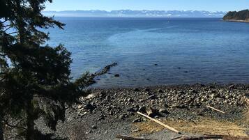 On the beach, sun loungers, beach towels