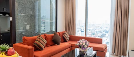 Executive Apartment, 2 Bedrooms | Living area | Flat-screen TV
