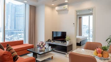 Executive Apartment, 2 Bedrooms | Living room | Flat-screen TV