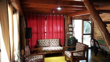 Exclusive Cabin | Living area | 42-inch LED TV with cable channels, TV