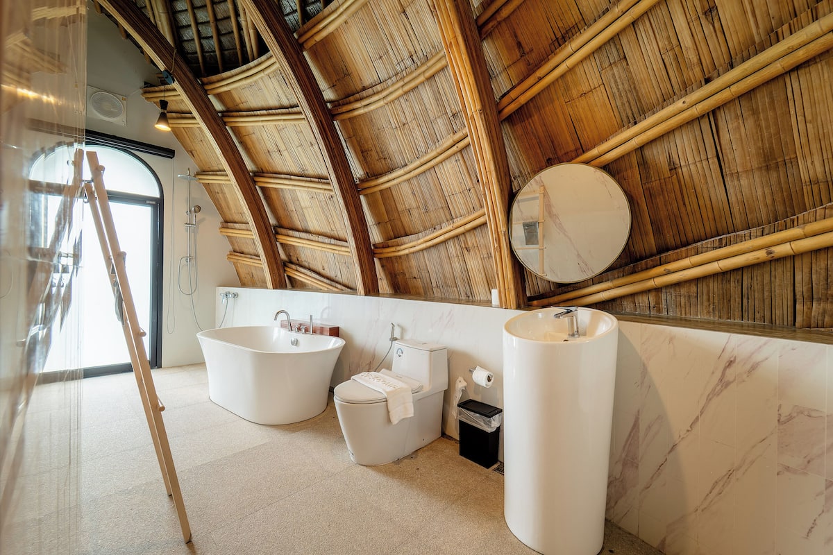 bamboo pool villa | bathroom | separate bathtub and shower, rainfall showerhead, free toiletries