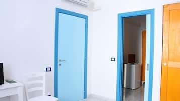 Quarto quádruplo, 2 quartos, no piso térreo | Escrivaninha, Wi-Fi de cortesia, roupa de cama