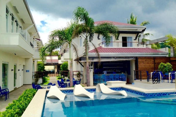 Outdoor pool, open 8 AM to 10 PM, sun loungers