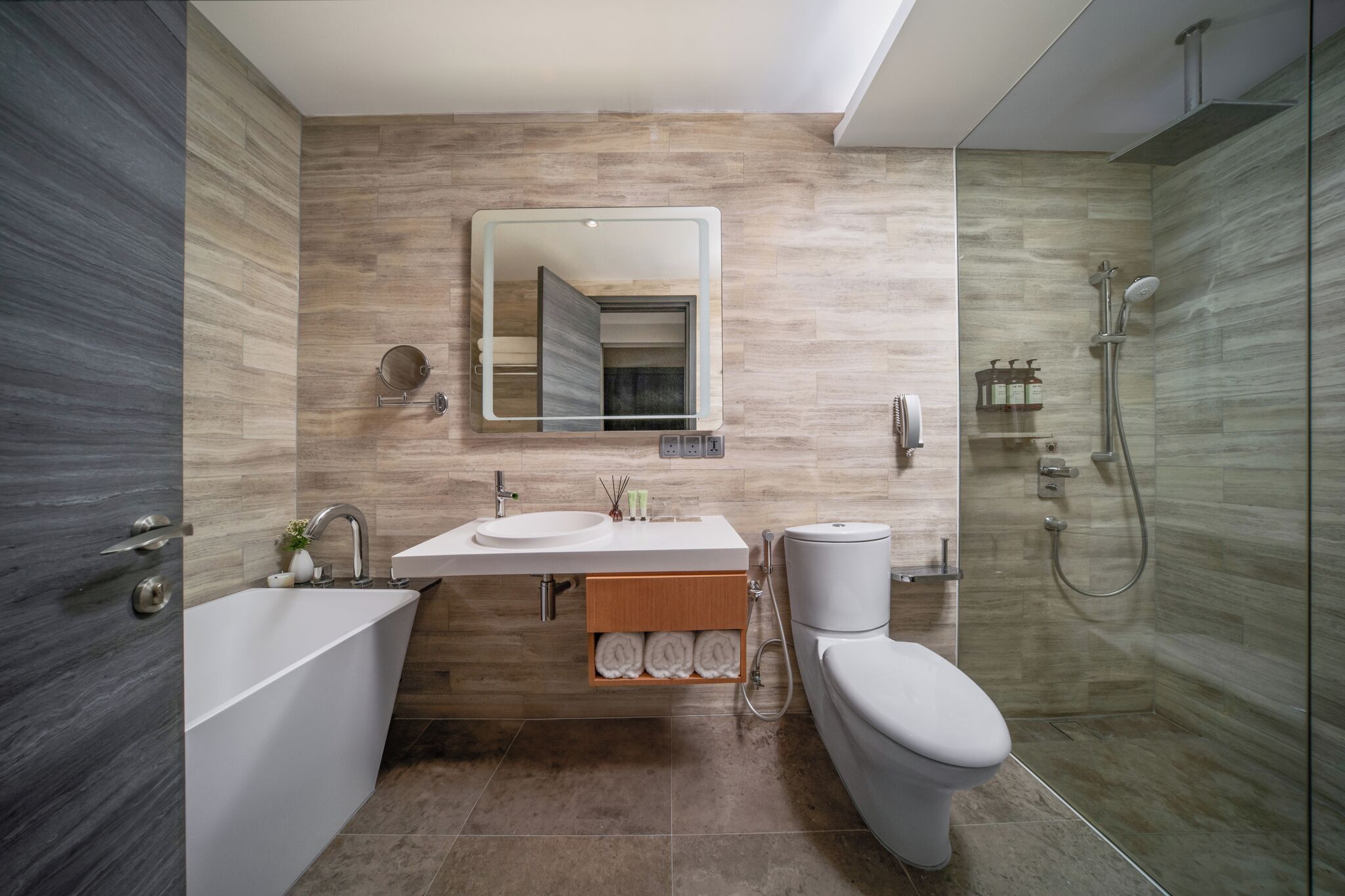 premier studio | bathroom | separate bathtub and shower, deep-soaking bathtub, rainfall showerhead