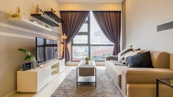 City Apartment, 2 Queen Beds | Living room | Flat-screen TV