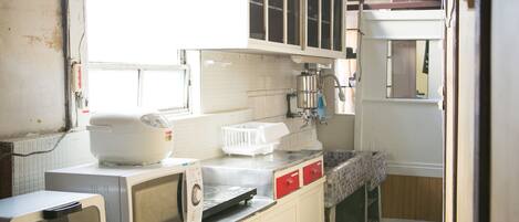 Townhome | Private kitchenette | Fridge, microwave, stovetop, coffee/tea maker