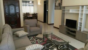 Executive Apartment, 2 Bathrooms, Pool View | Living area - Lighthomez Westlands Pride (Nairobi)