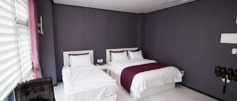 Chambre Triple | Literie de qualité supérieure, minibar, rideaux occultants, Wi-Fi