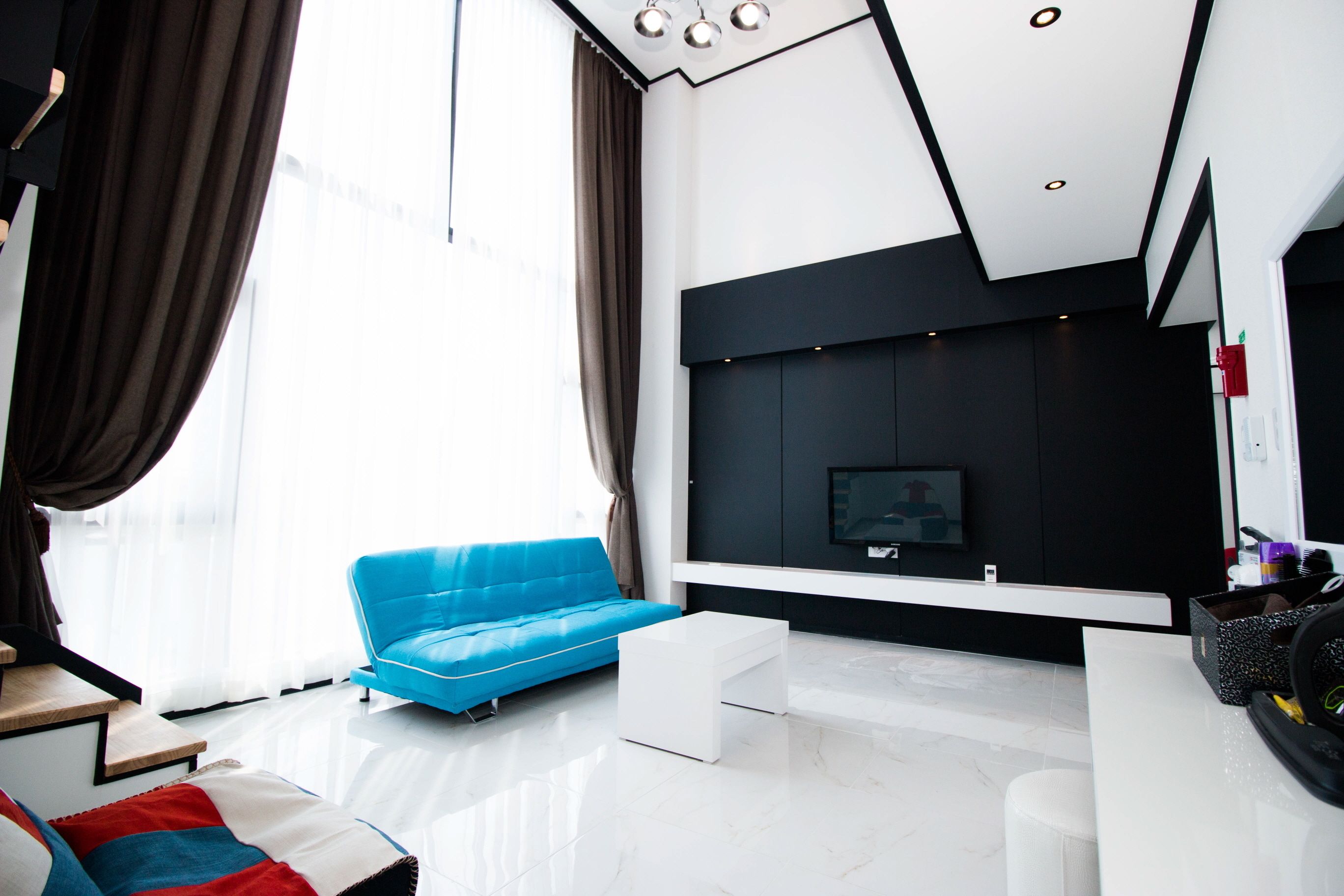 Family Duplex, 3 Bedrooms | Living area | 55-inch LCD TV with cable channels, TV, heated floors