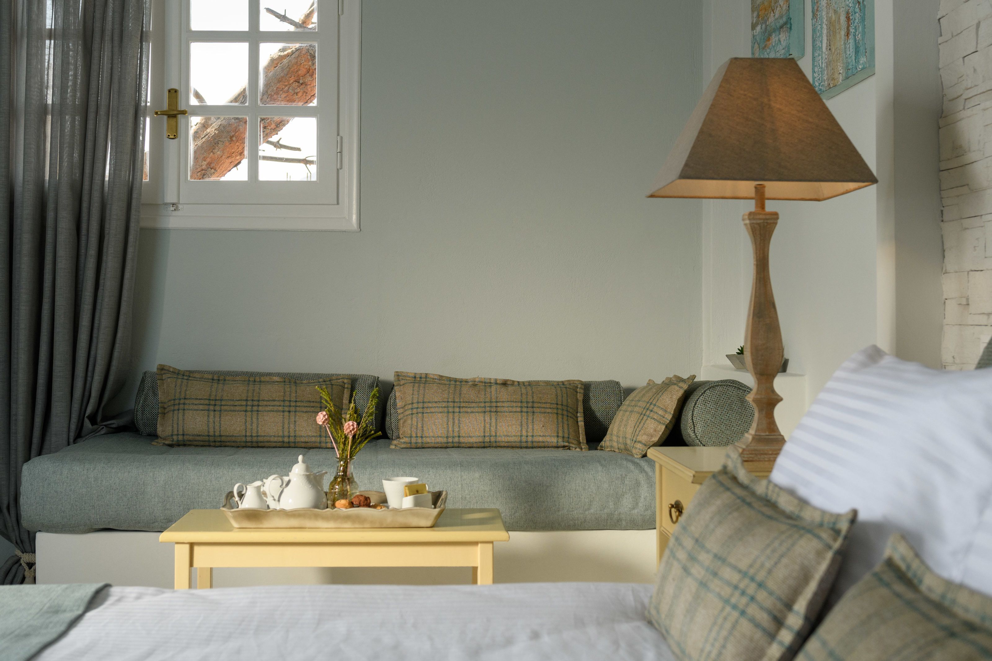 superior double room (upper floor) | in-room safe, individually decorated, desk, iron/ironing board